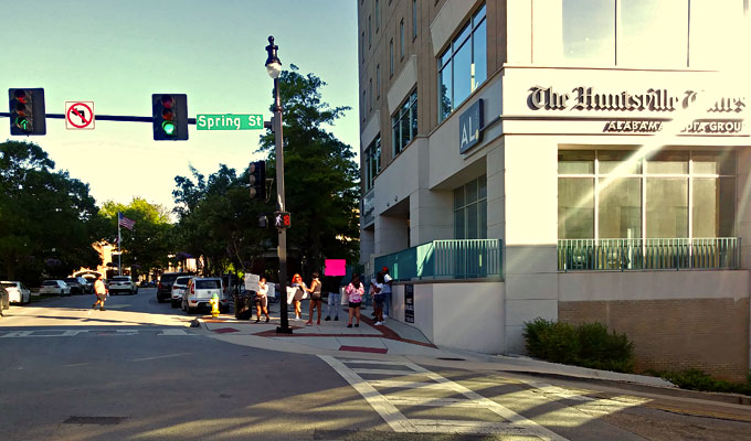 Huntsville George Floyd Protesters lingered in and around Big Spring Park on Saturday evening.