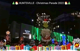 Mr. Grinch oversees Christmas parade and festivities in Huntsville as cultural divides and cynicism become increasingly apparent.
