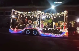 Christmas 2023 float decorated with bright lights and the Peanuts kids.