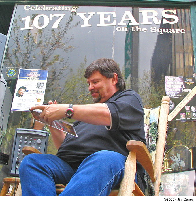 Jeff Cook of legendary country/pop band Alabama signs autographs at Harrison Brothers on the Square in HSV, AL