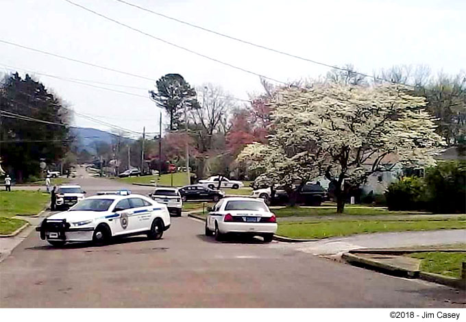 Police surround a suspect in West Huntsville